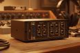 High-fidelity analog summing mixer in a studio environment, showing TRS and D-Sub connections, perfect for desktop and professional analog summing